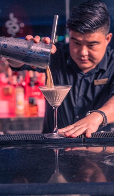 Staff making cocktails at Medusa Sky Lounge in Malta